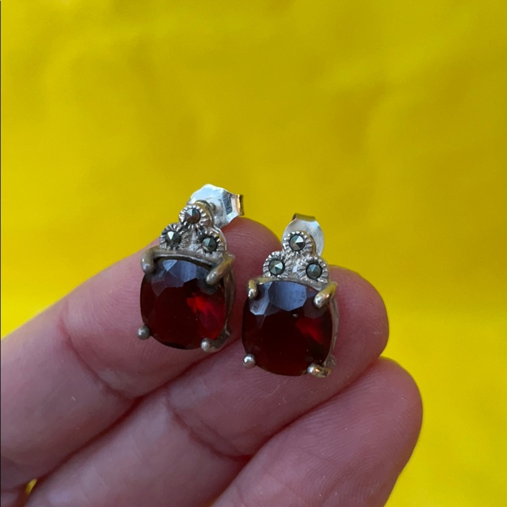 Antique sterling silver earrings with red stone